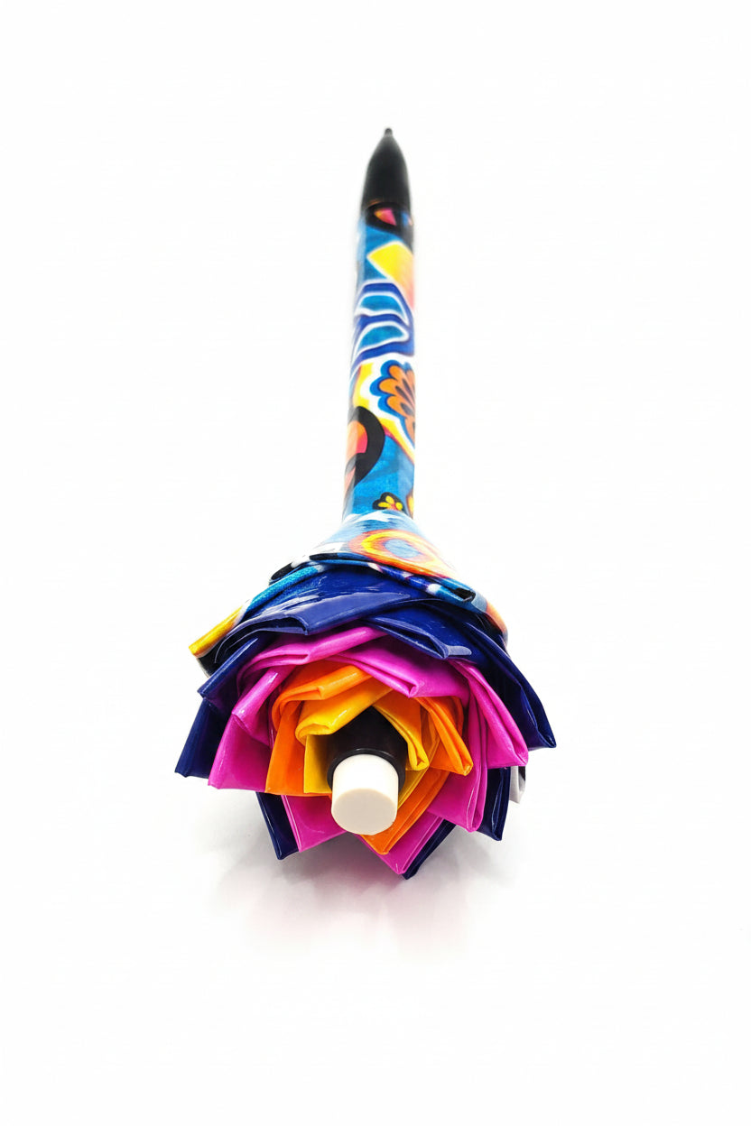 Colorful pen with a decorative top on a white background
